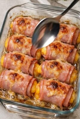 Roulés de poulet au jambon et au fromage, dorés et appétissants