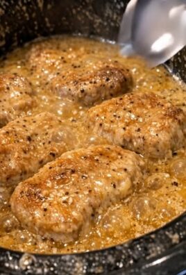 Côtelettes de porc crémeuses à l'ail et aux oignons à la mijoteuse